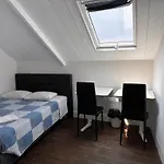 Vendégház In *