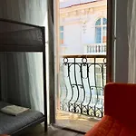 Vendégház In *